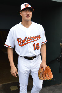 May 11, 2015; Baltimore, MD, USA; Baltimore Orioles starting pitcher Wei-Yin  Chen (16) walks onto the field before the game against the Toronto Blue Jays at Oriole Park at Camden Yards. Baltimore Orioles are wearing Baltimore on their home jersey's in support of the city after the recent unrest.  Mandatory Credit: Tommy Gilligan-USA TODAY Sports