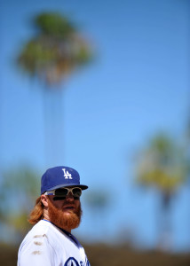 July 12, 2015; Los Angeles, CA, USA; Los Angeles Dodgers third baseman Justin Turner (10) during a stoppage in play in the ninth inning against the Milwaukee Brewers at Dodger Stadium. Mandatory Credit: Gary A. Vasquez-USA TODAY Sports