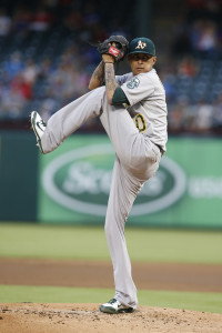 Sep 11, 2015; Arlington, TX, USA; Oakland Athletics starting pitcher Jesse Chavez (30) throws a pitch in the first inning against the Texas Rangers at Globe Life Park in Arlington. Mandatory Credit: Tim Heitman-USA TODAY Sports