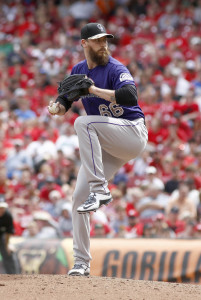 May 25, 2015; Cincinnati, OH, USA; Colorado Rockies relief pitcher John Axford (66) throws against the Cincinnati Reds in the ninth inning at Great American Ball Park. The Rockies won 5-4. Mandatory Credit: David Kohl-USA TODAY Sports