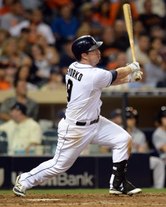 Sep 23, 2015; San Diego, CA, USA; San Diego Padres shortstop Jedd Gyorko (9) hits a game winning walk off RBI single against the San Francisco Giants during the ninth inning to win the game 5-4 at Petco Park. Mandatory Credit: Jake Roth-USA TODAY Sports