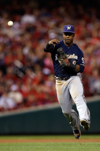 Sep 26, 2015; St. Louis, MO, USA; Milwaukee Brewers shortstop Jean Segura (9) makes a play during the eighth inning of a baseball game against the St. Louis Cardinals at Busch Stadium. Mandatory Credit: Scott Kane-USA TODAY Sports