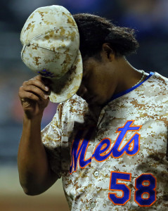 Sep 15, 2014; New York, NY, USA; New York Mets relief pitcher Jenrry Mejia (58) reacts walking to the dugout against the Miami Marlins during the eighth inning at Citi Field. Mandatory Credit: Adam Hunger-USA TODAY Sports