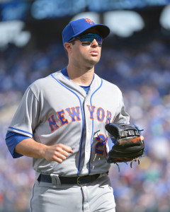 Apr 5, 2016; Kansas City, MO, USA; New York Mets second baseman Neil Walker (20) returns to the dugout in between innings in the game against the Kansas City Royals at Kauffman Stadium. The Mets won 2-0. Mandatory Credit: Denny Medley-USA TODAY Sports