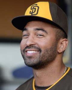 San Diego Padres outfielder Matt Kemp laughs during a news