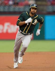 Aug 16, 2016; Arlington, TX, USA; Oakland Athletics center fielder Coco Crisp (4) runs to third base during the game against the Texas Rangers at Globe Life Park in Arlington. Mandatory Credit: Jerome Miron-USA TODAY Sports