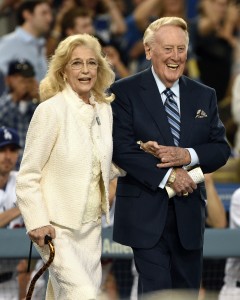 Sep 23, 2016; Los Angeles, CA, USA; American broadcaster Vin Scully (right) is introduced with wife Sandra Scully (left) for Vin Scully appreciation night prior to the game between the Los Angeles Dodgers and Colorado Rockies at Dodger Stadium. Mandatory Credit: Kelvin Kuo-USA TODAY Sports