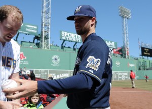 Apr 6, 2014; Boston, MA, USA; Milwaukee Brewers relief pitcher Tyler Thornburg (30) signs an autograph prior to a game against the Boston Red Sox at Fenway Park. Mandatory Credit: Bob DeChiara-USA TODAY Sports