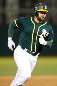 May 6, 2017; Oakland, CA, USA; Oakland Athletics first baseman Yonder Alonso (17) rounds third base after hitting a two run home run against the Detroit Tigers during the sixth inning at Oakland Coliseum. Mandatory Credit: Stan Szeto-USA TODAY Sports