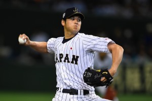 TOKYO, JAPAN - NOVEMBER 19: Starting pitcher Shohei Otani #16 of Japan throws in the top of fifth inning during the WBSC Premier 12 semi final match between South Korea and Japan at the Tokyo Dome on November 19, 2015 in Tokyo, Japan. (Photo by Masterpress/Getty Images)