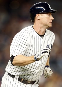 Sep 14, 2017; Bronx, NY, USA; New York Yankees third baseman Chase Headley (12) watches his RBI single against the Baltimore Orioles during the first inning at Yankee Stadium. Mandatory Credit: Adam Hunger-USA TODAY Sports