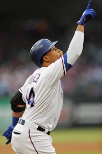 Sep 2, 2017; Arlington, TX, USA; Texas Rangers center fielder Carlos Gomez (14) points to the sky as he runs home on his solo home run against the Los Angeles Angels during a baseball game at Globe Life Park in Arlington. Mandatory Credit: Jim Cowsert-USA TODAY Sports