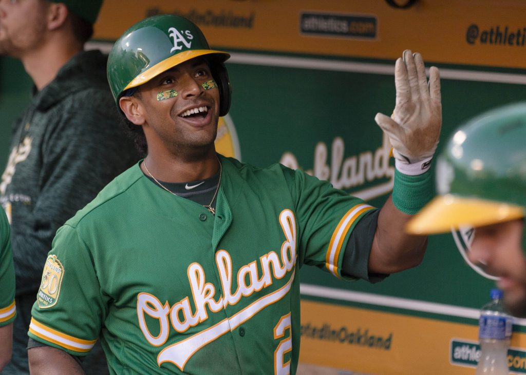A's Khris Davis crushes home run while wearing jersey signed by