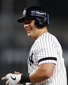 New York Yankees first baseman Luke Voit (59) looks on from the dugout  against the Toronto Blue Jays during the first inning of a baseball game on  Wednesday, Sept. 8, 2021, in