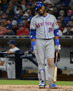 Seattle Mariners' Robinson Cano swings at a pitch in front of