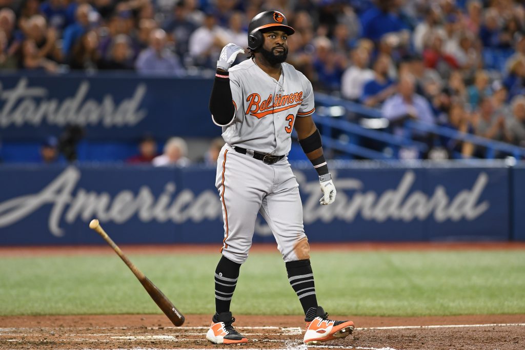 Baltimore Orioles' Dwight Smith Jr., right, is congratulated by