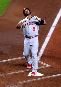 Albert Pujols: Gives and gets gifts at Wrigley Field