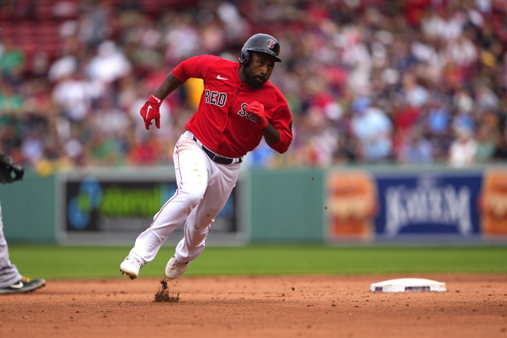 A Red Sox fan came up with the baseball on Jackie Bradley Jr.'s