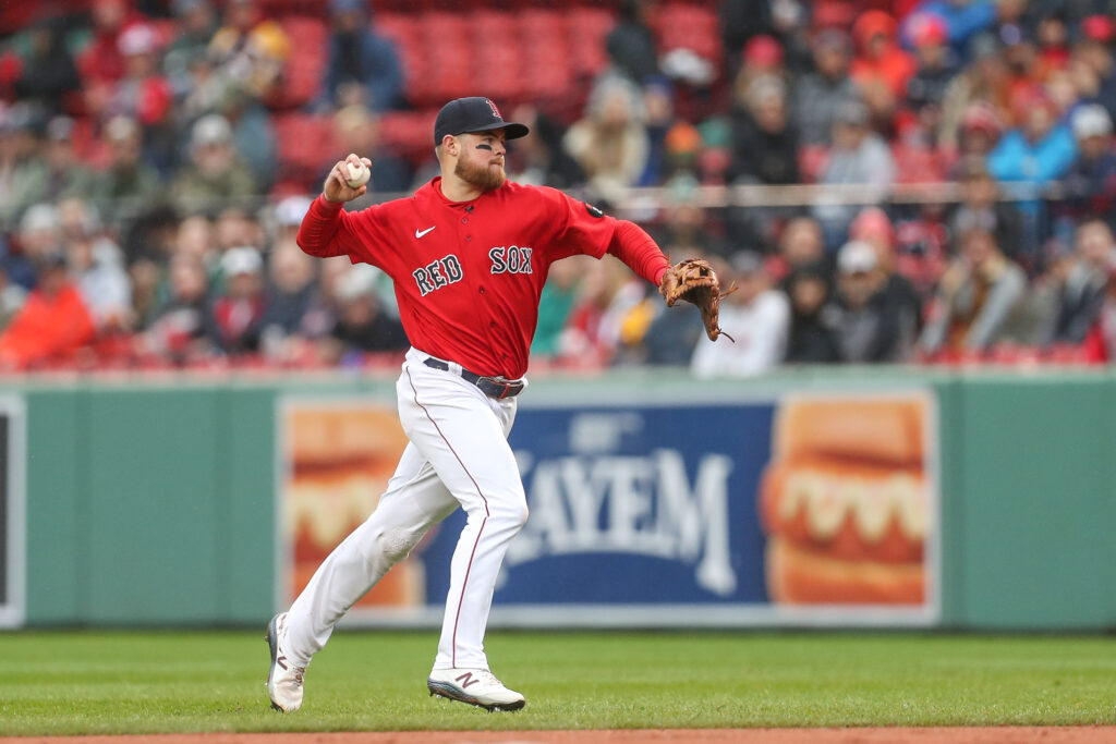 Boston Red Sox RP Joely Rodriguez points skyward at the conclusion