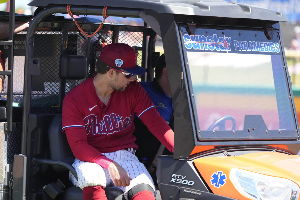 The Athletic MLB on X: Phillies first baseman Rhys Hoskins was carted off  the field after suffering an apparent left knee injury during  Philadelphia's game against Detroit on Thursday.    /