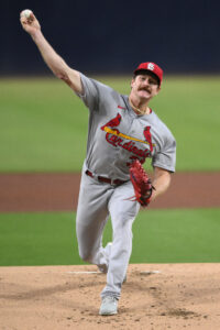 Carlson homers twice, Mikolas gets first win in two years