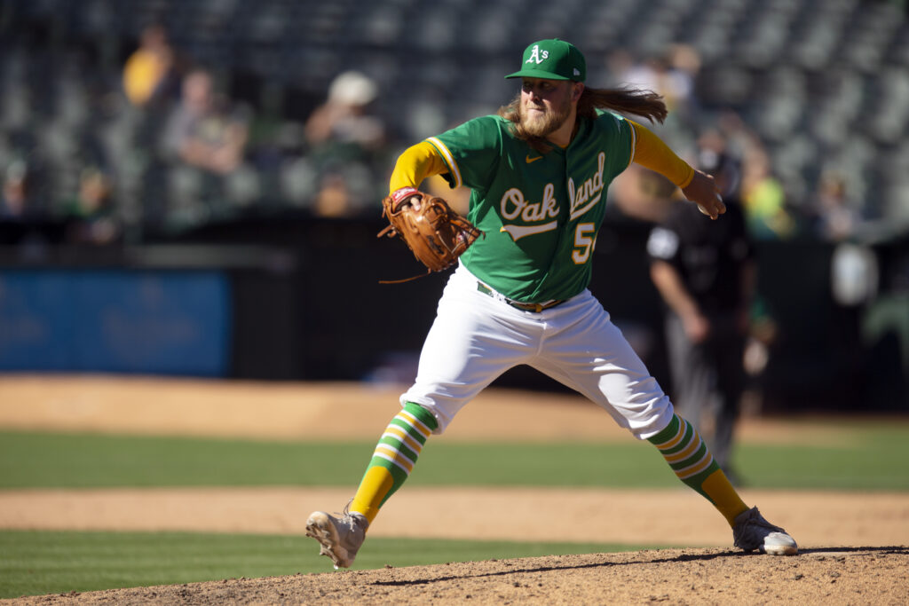 A's, Rangers keep Rosales busy with roster moves