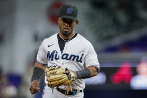 Miami Marlins baseball infielder Jean Segura puts on a Marlins