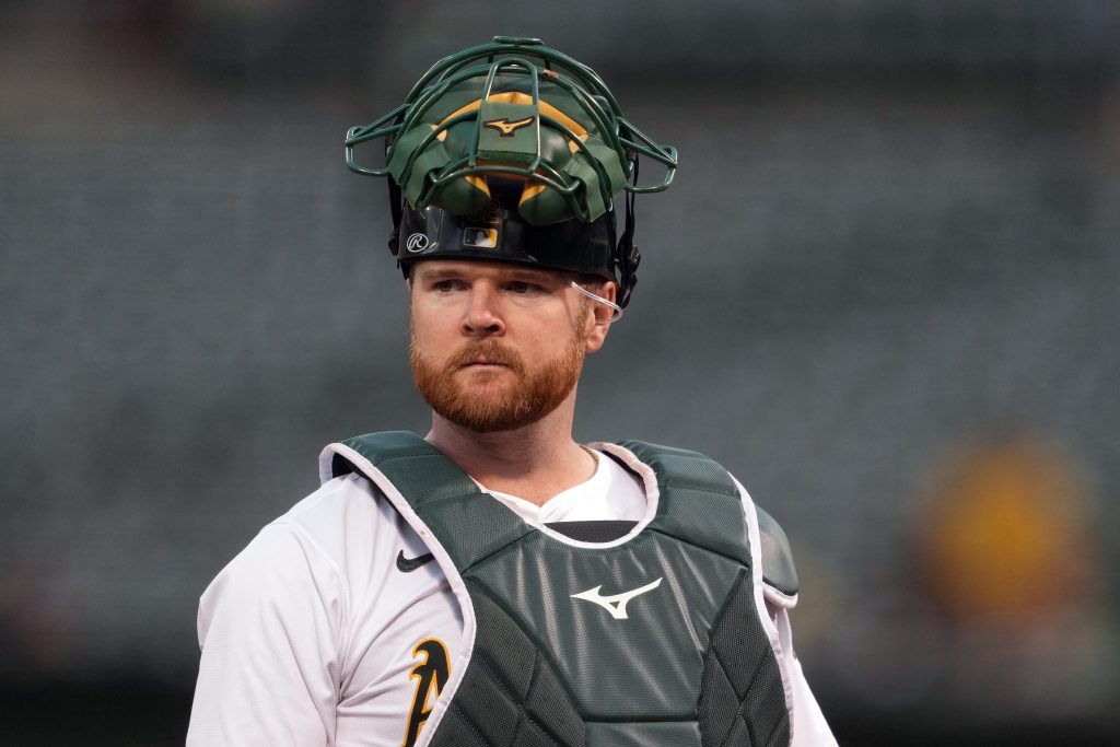 Athletics Outright Kyle McCann, Anthony Maldonado