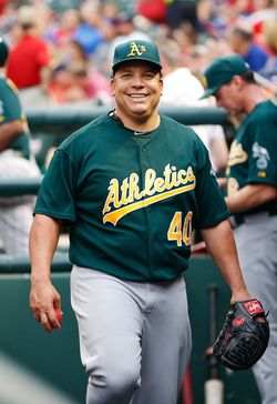 Bartolo Colon is happy to be with the Rangers so he doesn't have to hit or  run 